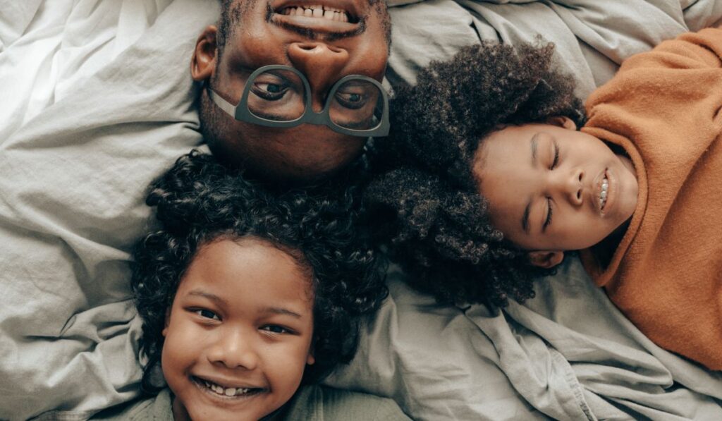 Emotionally-Balanced Children with their father.