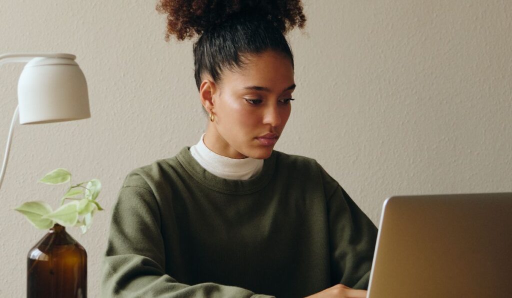 Woman reflecting on her persona.