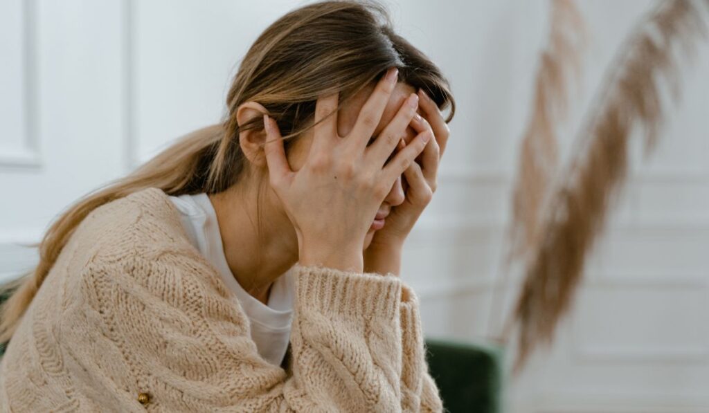 Woman learning how to relieve suffering in her life.
