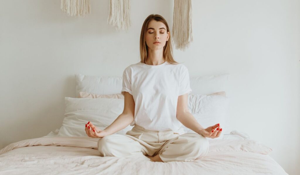 Woman discovering The Ultimate Goal of Meditation in Buddhism.
