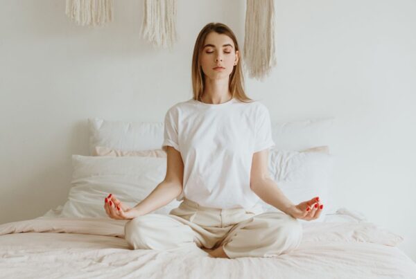 Woman discovering The Ultimate Goal of Meditation in Buddhism.