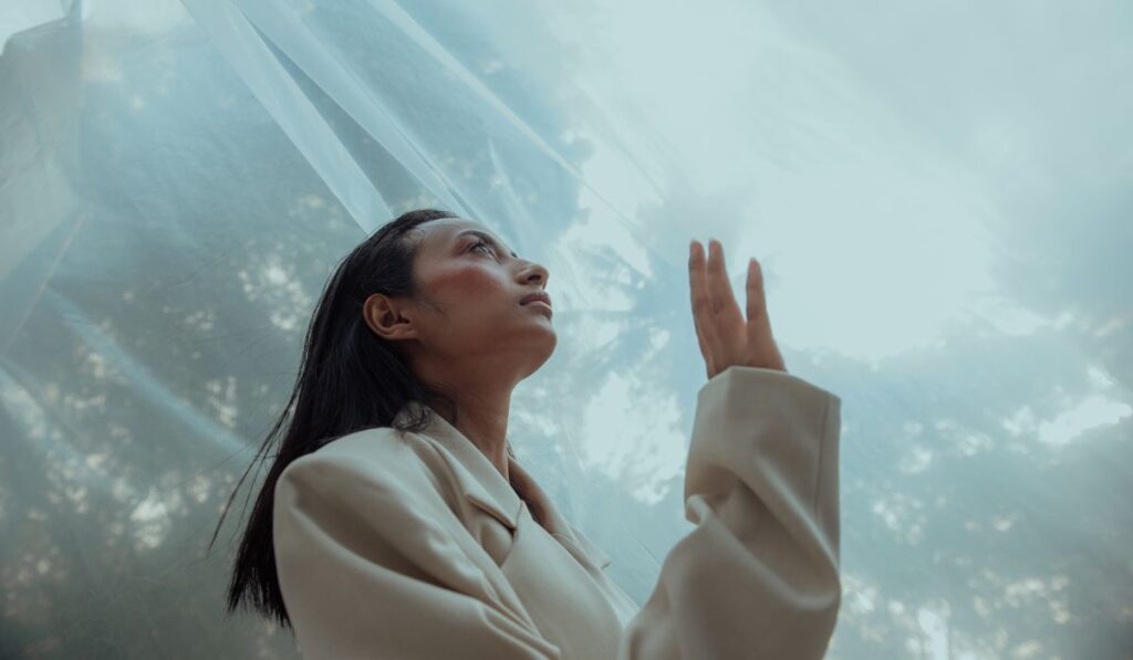 Woman going through the dark night of the soul.