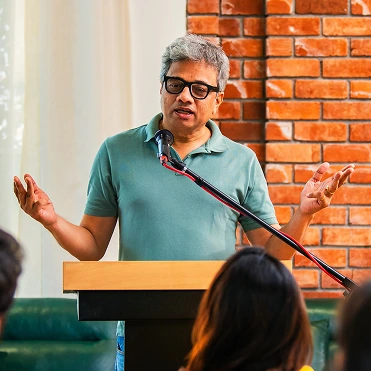 life coach speaking in the podium