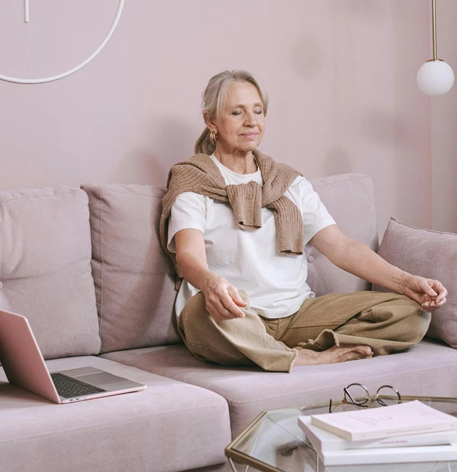 older woman meditating