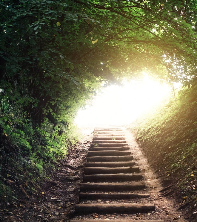 stone stairs to glowing beam of light