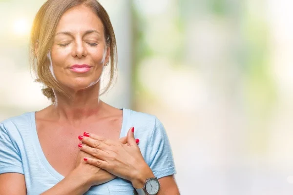 middle-aged woman expressing relief
